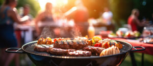 Barbecue grill during party at backyard with blured a lot of friends morning